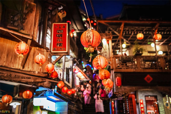 Jiufen Old Street with red lanterns in the mountain village of Jiufen, Taiwan