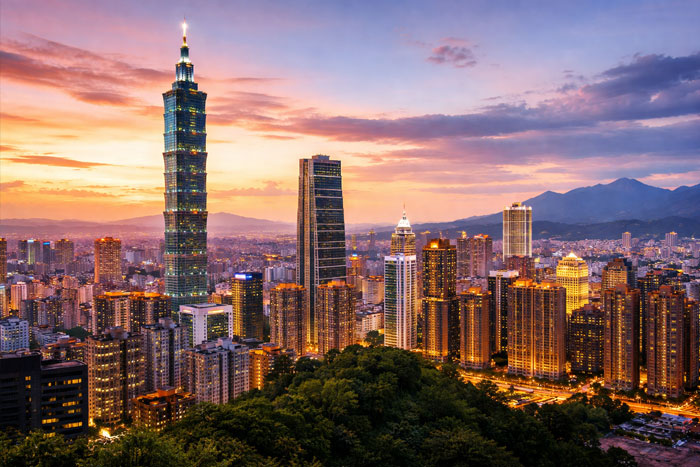 Taipei skyline with Taipei 101 skyscraper and surrounding mountains in Taiwan