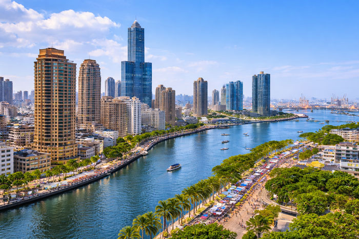 View of Kaohsiung in Taiwan with the Love River and modern skyline during the day